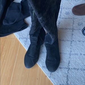 Black thigh high boots